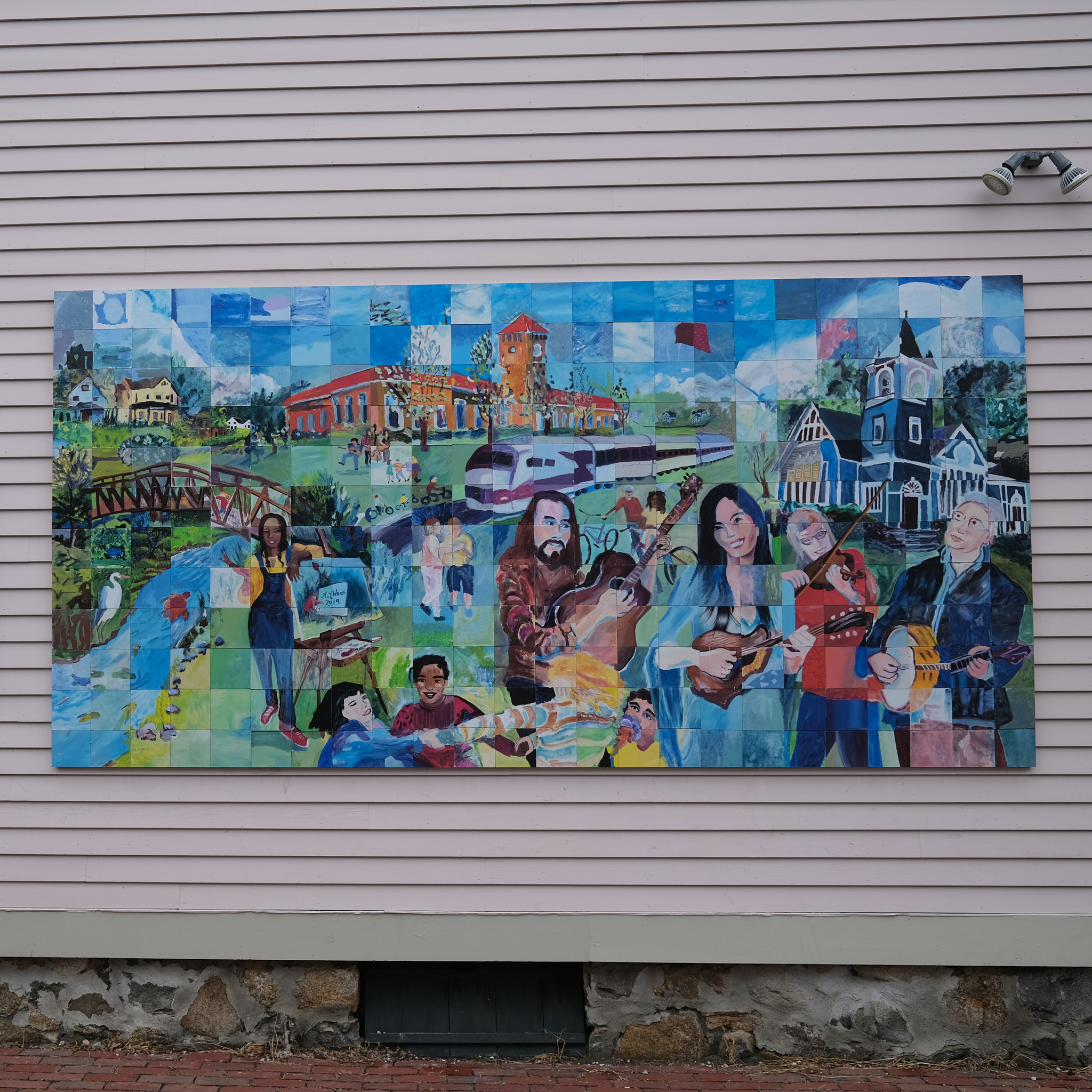 Mural of multiple people and cultural things happening in West Concord