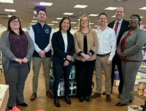 Meeting at Acton Paper Store, from left, Operations Manager Rachel Jacobs, Cataldo Aide Kyle Stapleton, Economic Development Secretary Yvonne Hao, Vice President of Stores Sara Carbonier, CEO Tom Anderson, State Senator Jamie Eldridge, and Acton DIrector of Economic Development Julie Pierce