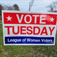 Red, white, and blue Vote Tuesday sign to remind people to vote.