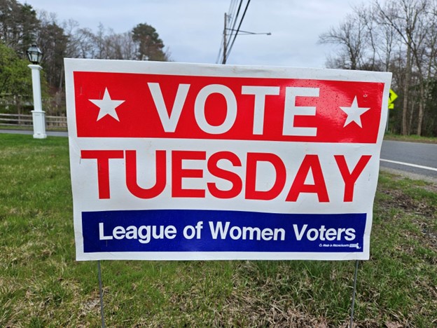 Red, white, and blue Vote Tuesday sign to remind people to vote.