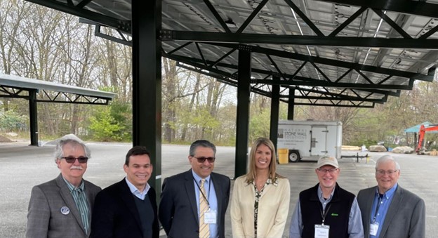 Clean Energy Advocates under the solar carports at Congregation Beth Elohim