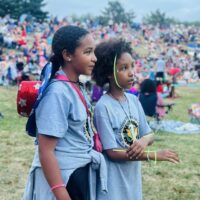 Two girls enjoy the Independence day activities.