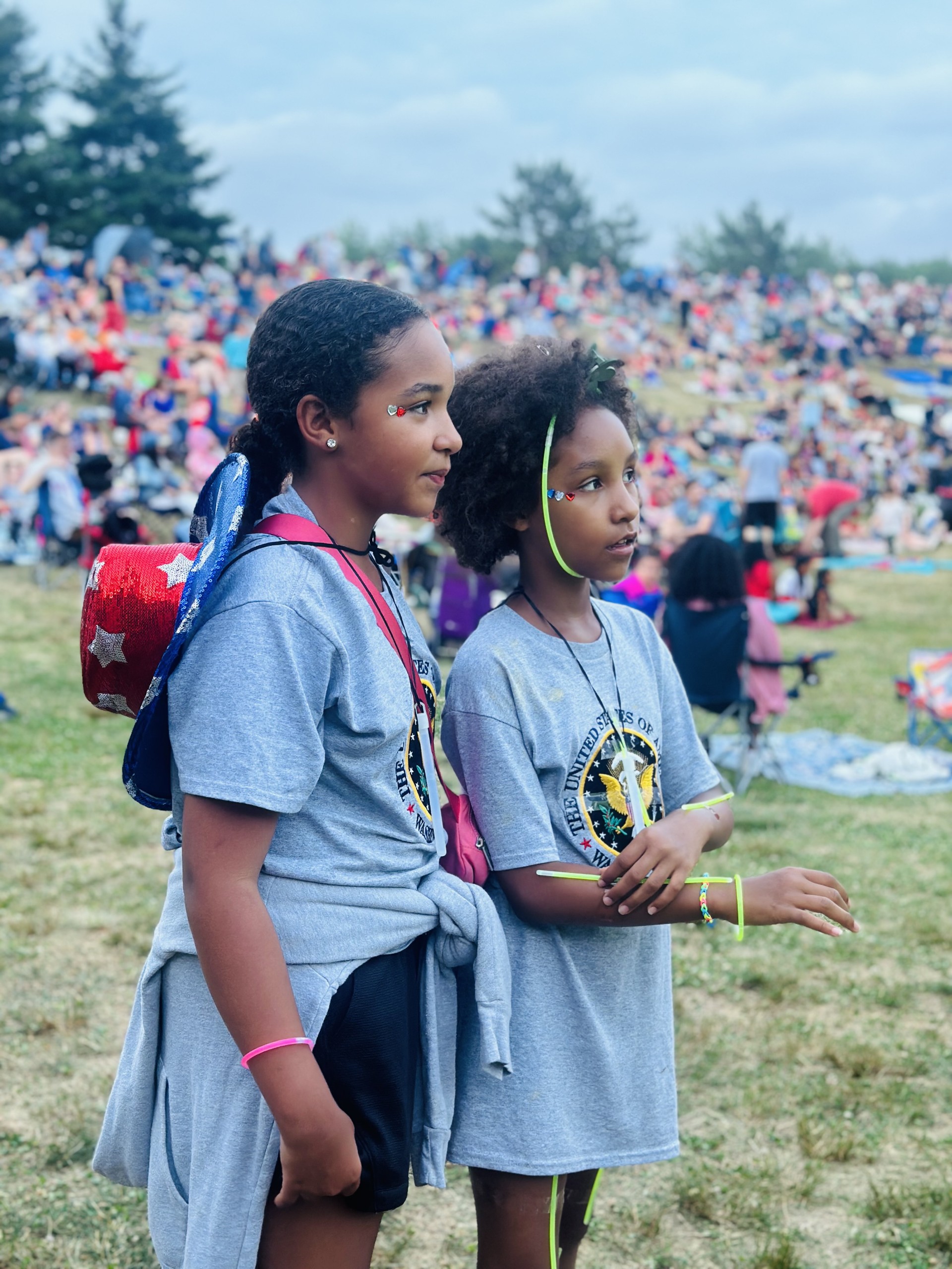 Two girls enjoy the Independence day activities.