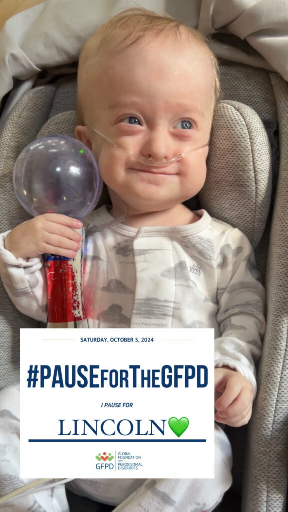 Photograph of a smiling baby with a toy, and an oxygen supply. Superimposed on the photo is a label saying "#Pause for the GFPD.  I pause for Lincoln." 