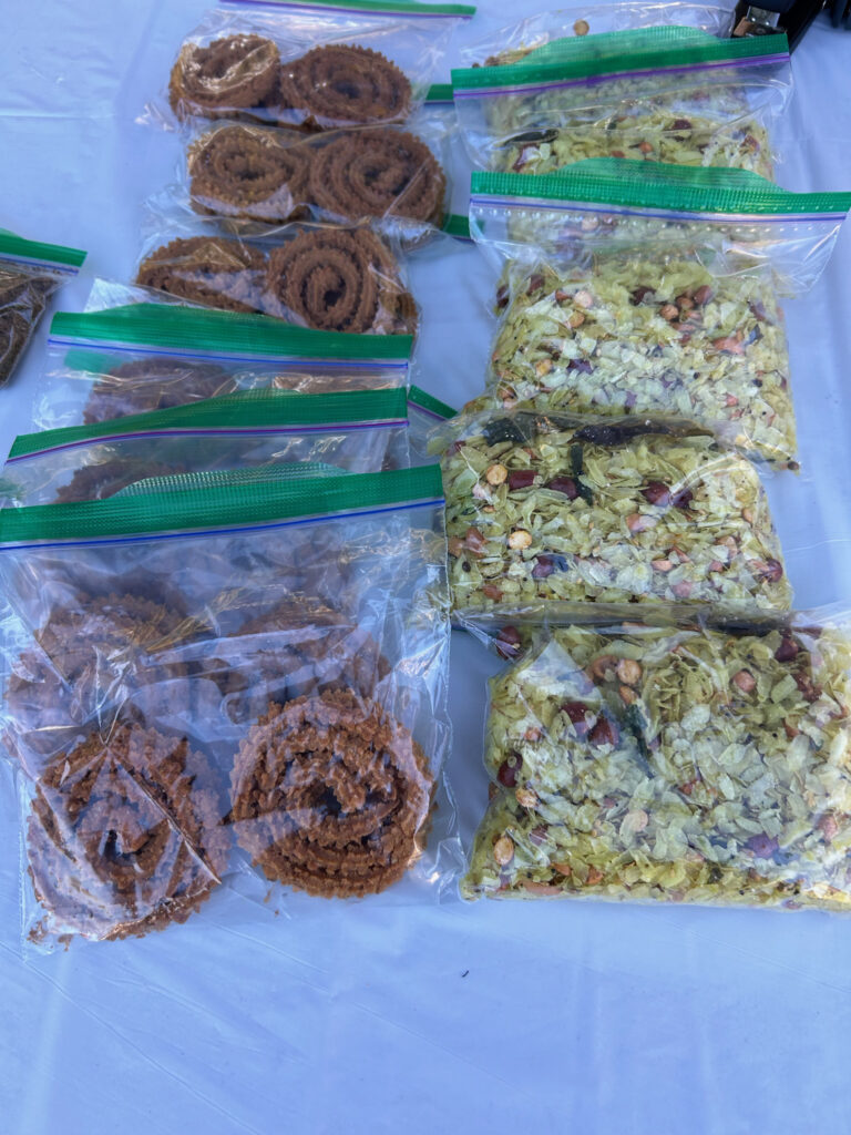 Baggies full of two different kinds of snacks for sale.