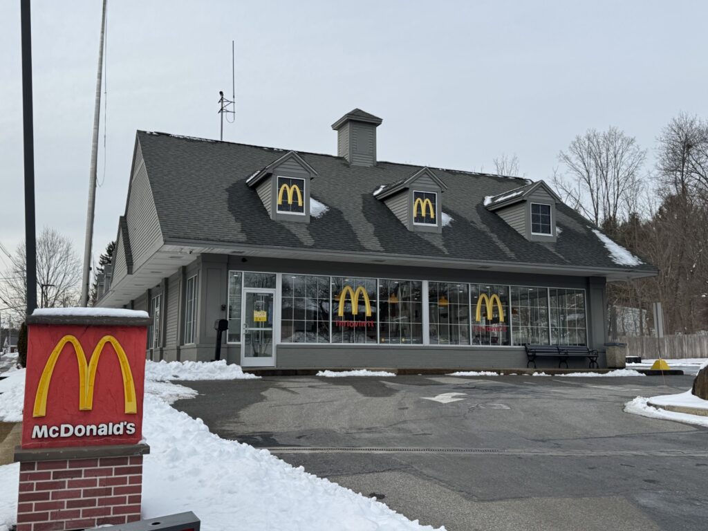 A stand-alone McDonalds that is about as attractive as a McDonald's can be.